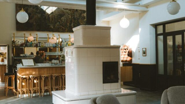 Lobby poêle en fonte, Restaurant Le Barn, salles de réception